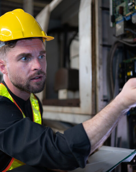 The engineer inspects the electrical system and repairs the mech The engineer inspects the electrical system and repairs the mechanical system in the machine control cabinet. in order for the machine to return to normal operation