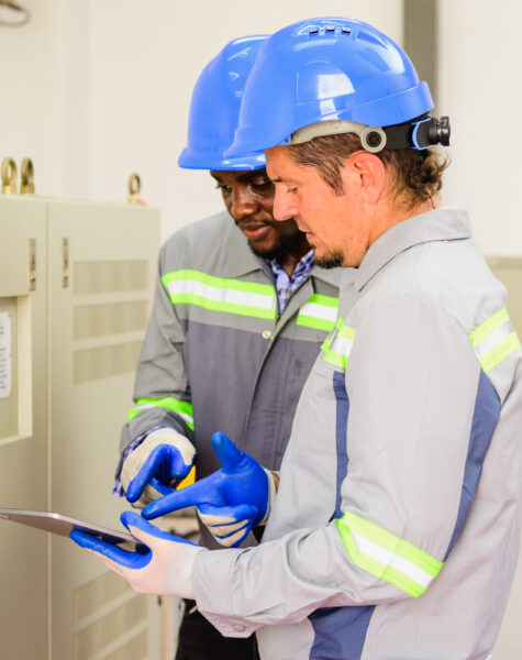 Happy maintenance engineer checking and maintaining solar panels system Happy maintenance engineer checking and maintaining solar panels system on solar cell farm, Technician working on ecological solar farm, People with clean energy technology, Renewable energy, Solar power plant station